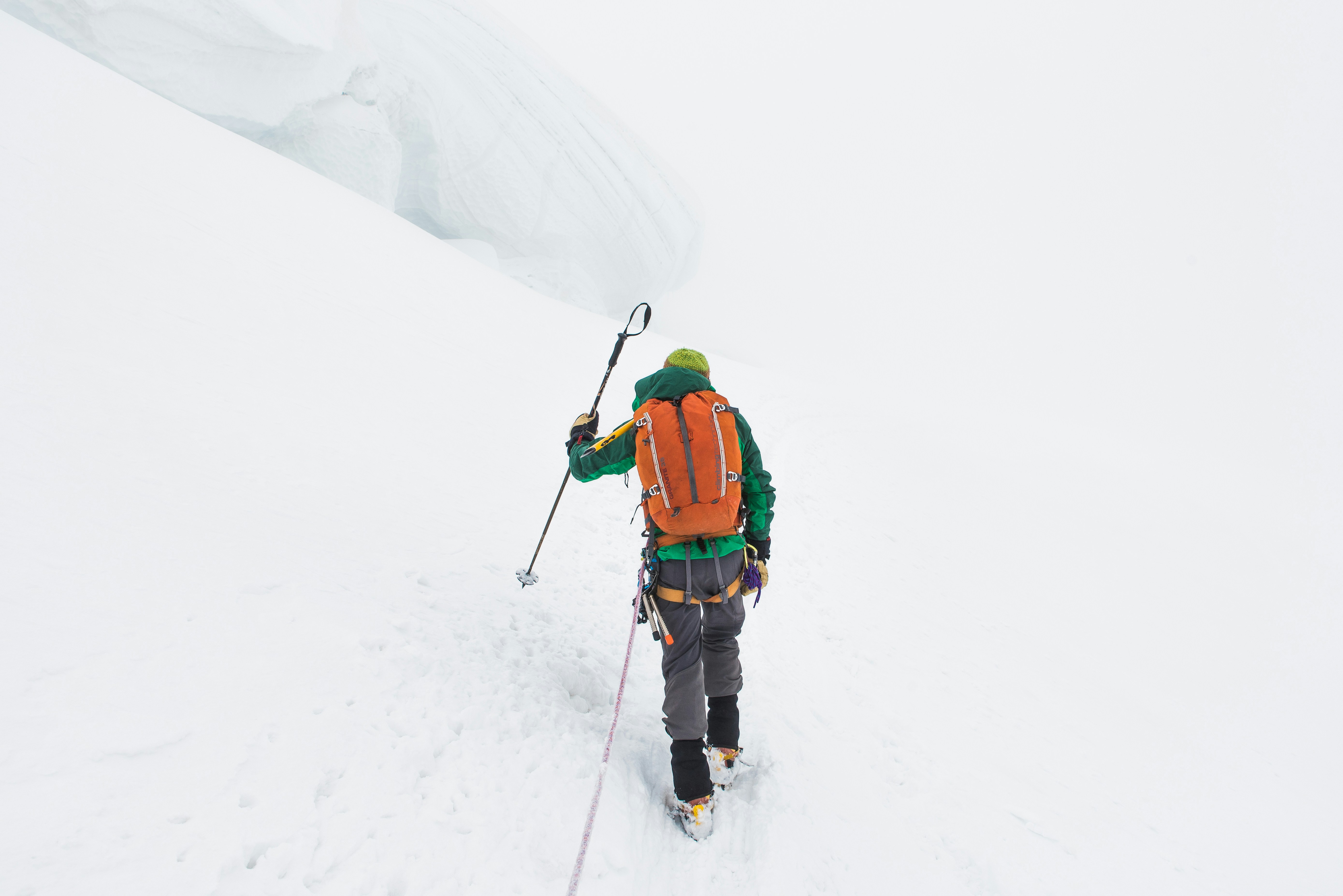 Mountaineering from ABVIMAS Manali India: advanced mountaineers on steep ice face practicing technical climbing